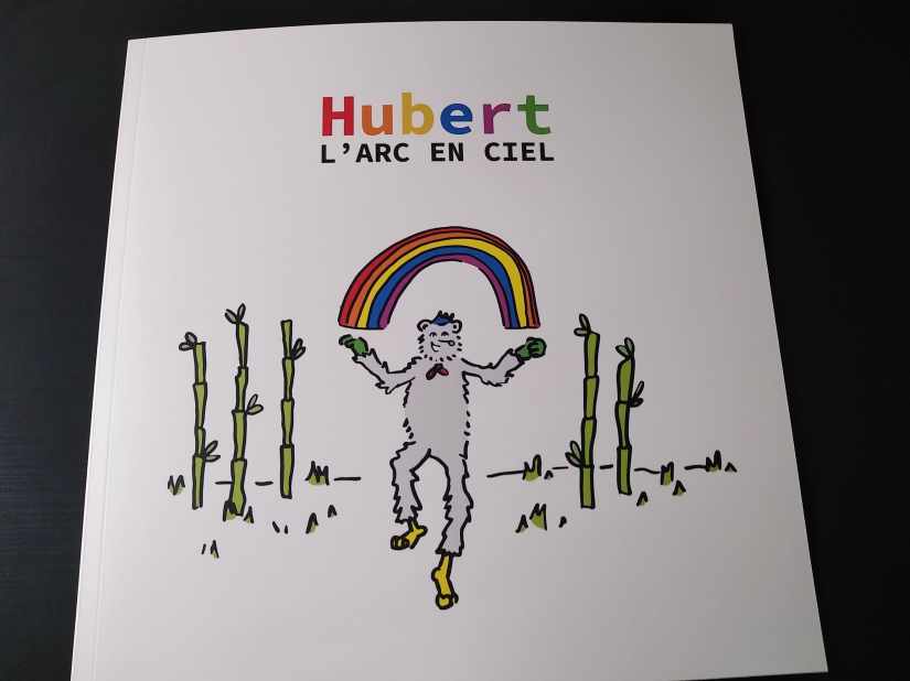 livre avec écrit Hubert l'arc en ciel
